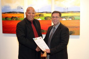 Mr. Errol Gradwell (CEO: EWSETA) and Prof. Eugene Cloete (Vice Rector: Research and Innovation at the Stellenbosch University) during the signing of the agreement